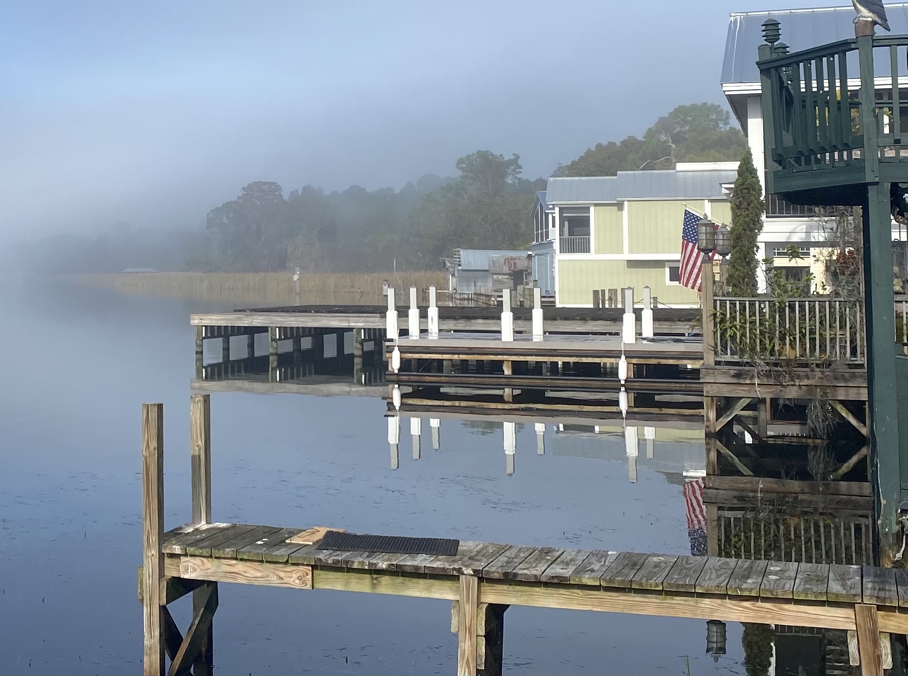 Quiet misty Florida waterfront with docks